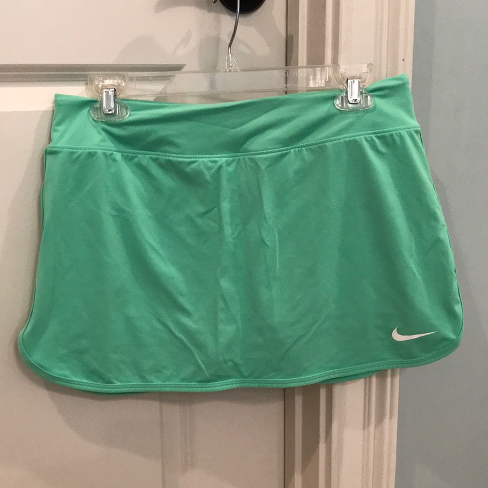 Nike women’s skirt, bright green, size M